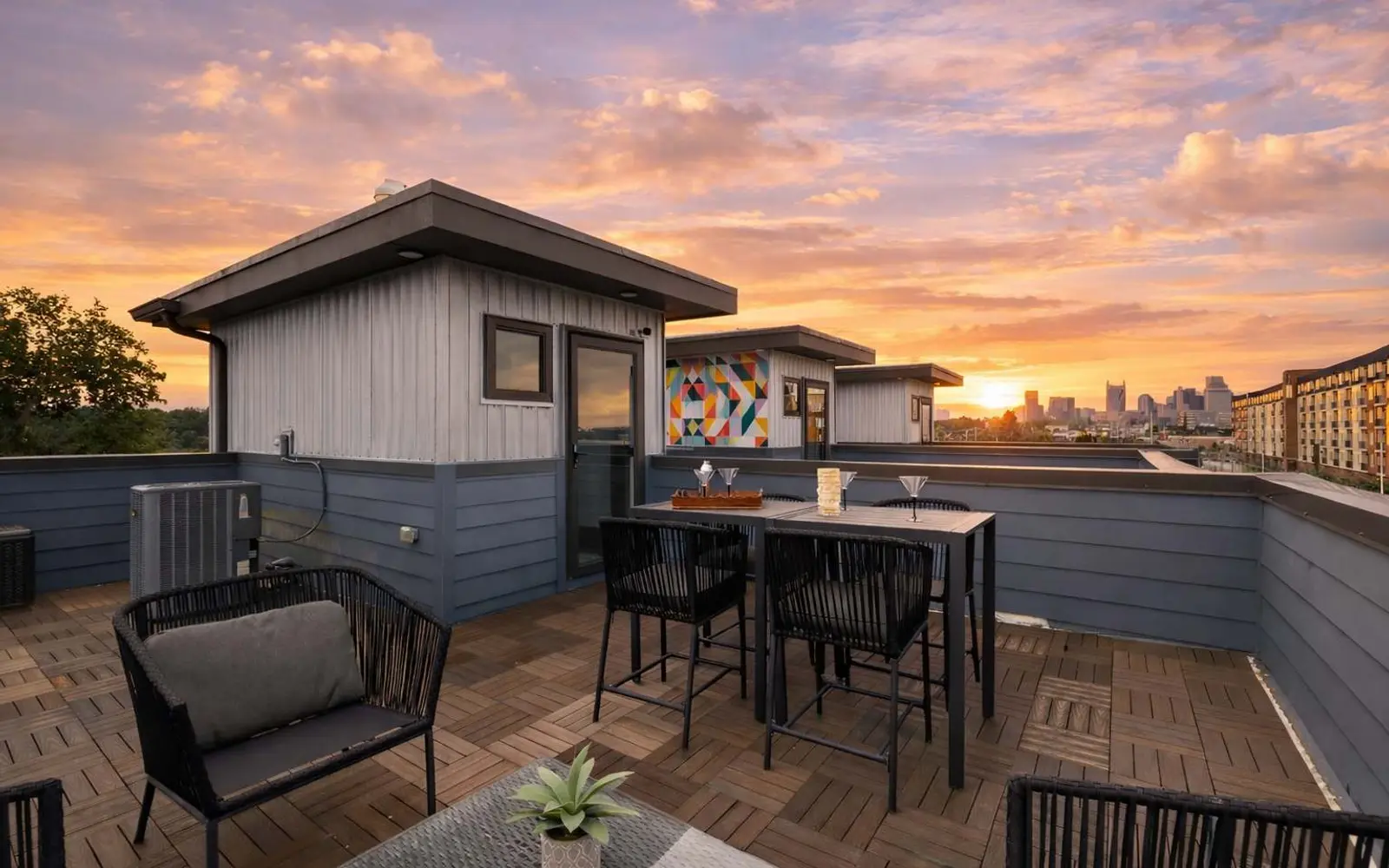 Rooftop deck at sunset with the Nashville skyline, at a home Venturebnb manages