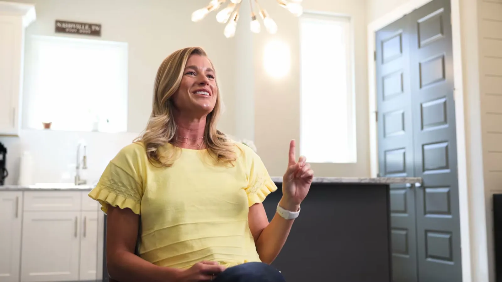Jessica, a Nashville Venturebnb owner, in the kitchen of her townhome